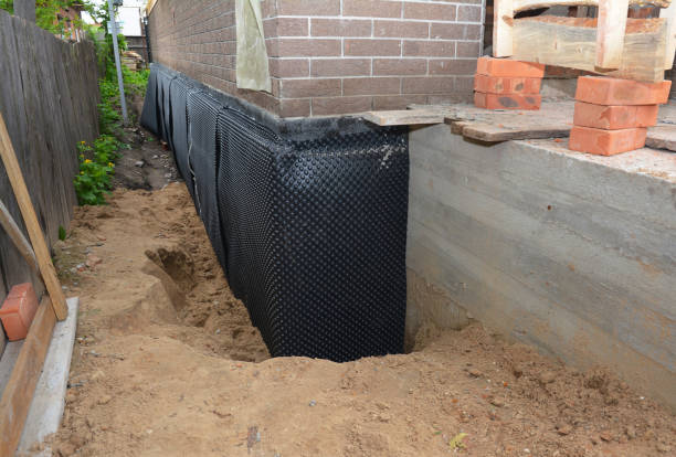Happy homeowners after waterproofing job in Sparks Glencoe